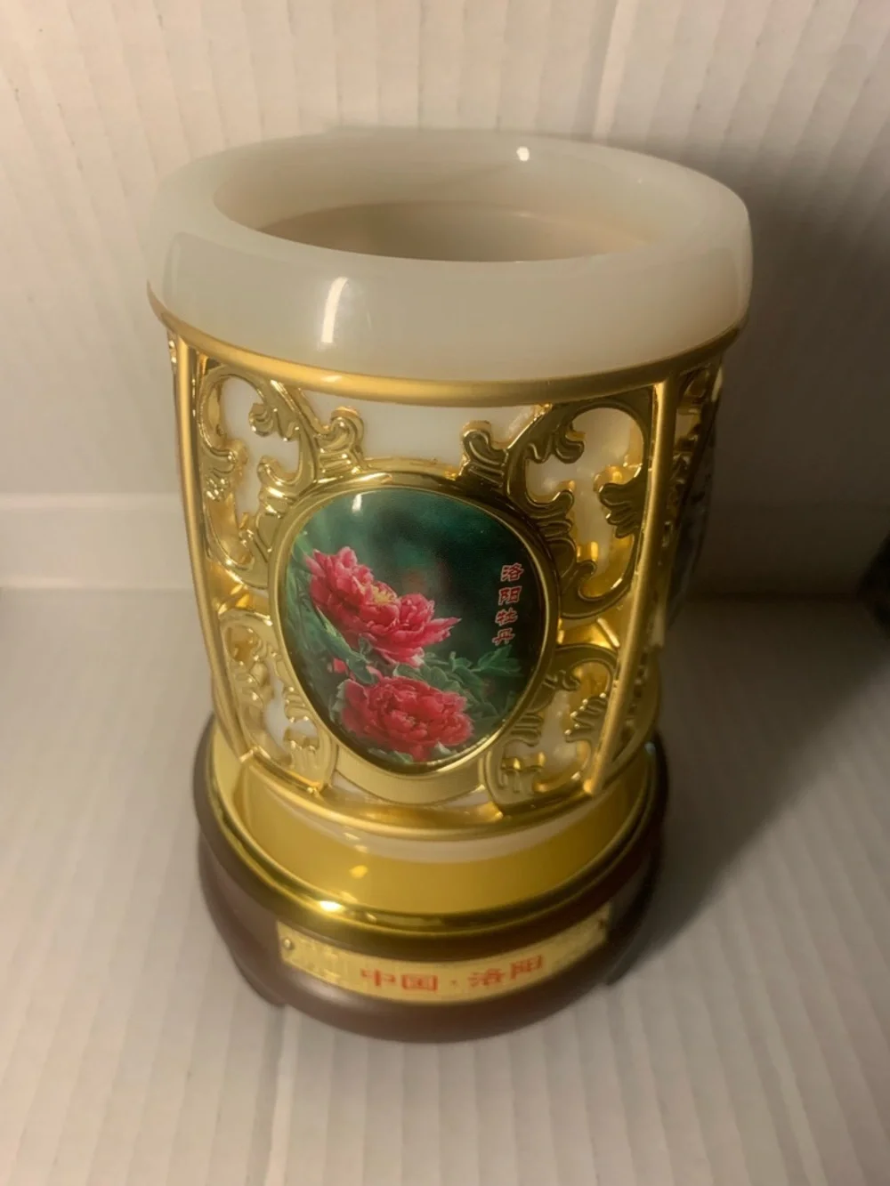Ornate Gold and White Decorative Vase with Floral Medallion